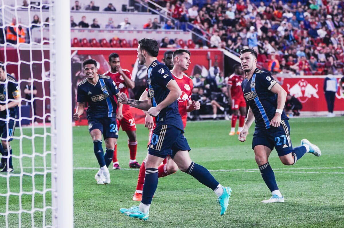 The Union celebrate the only score of the game against the Red Bulls.