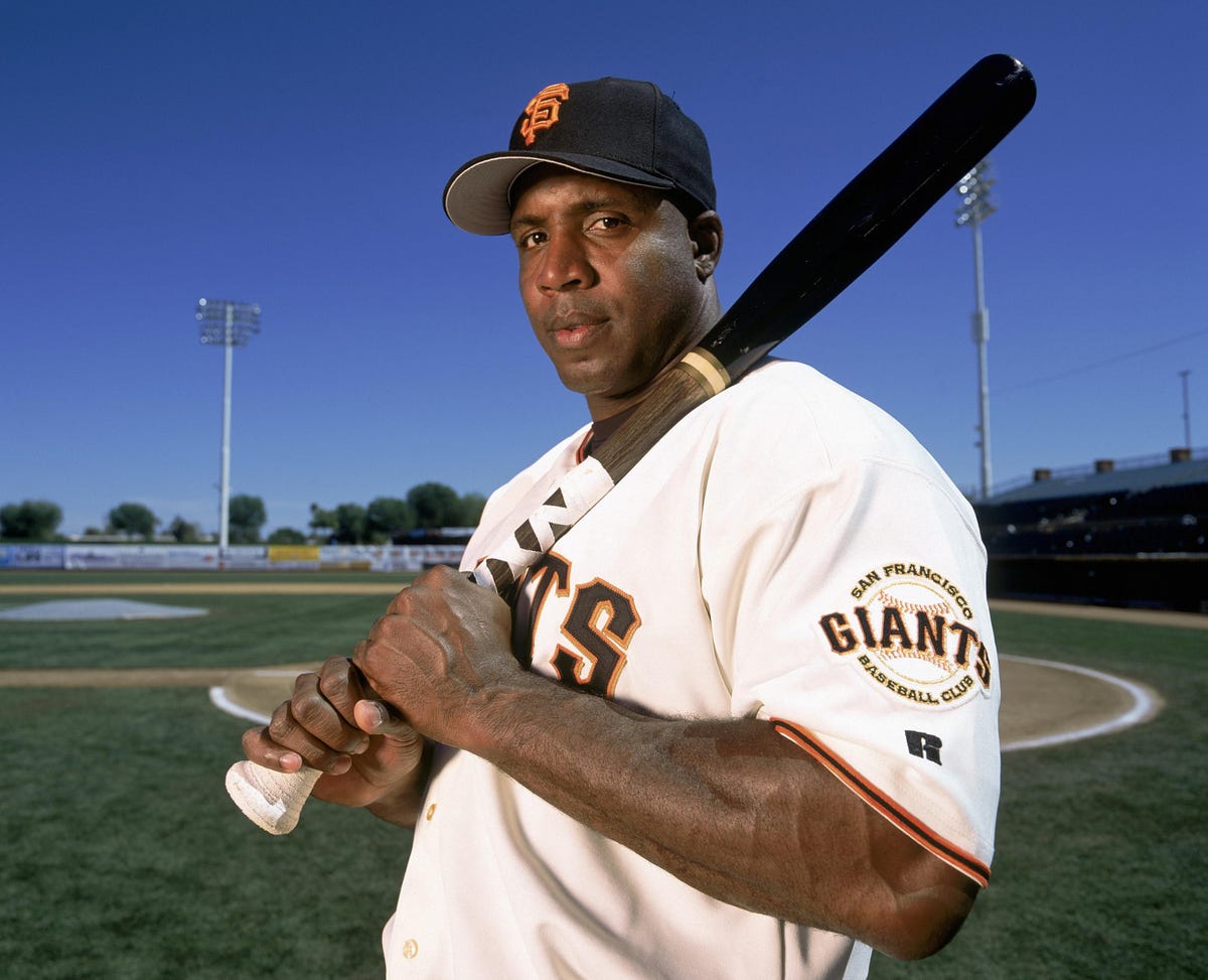 San Francisco's Barry Bonds poses for a photo with a bat in hand.
