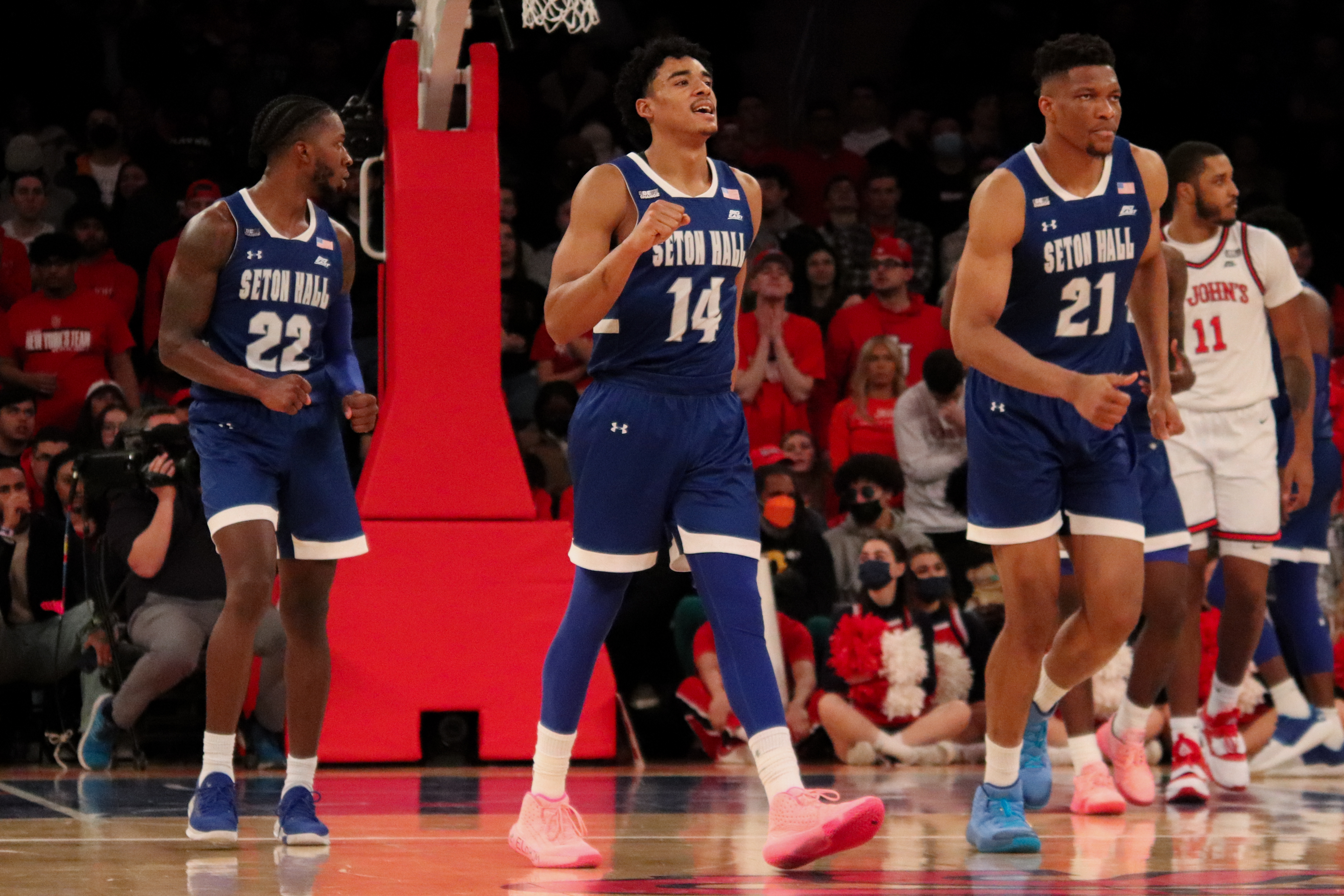 Seton Hall's players stand on the court.