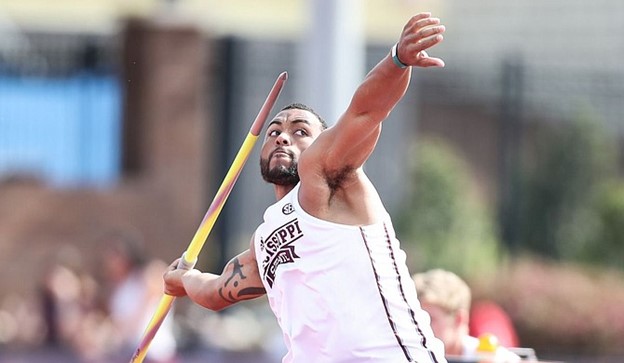 Team USA's Curtis Thompson begins to throw the javelin during an event for his college's field program.