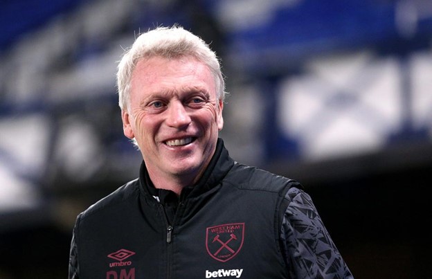 West Ham's David Moyes smiles during a West Ham soccer game.