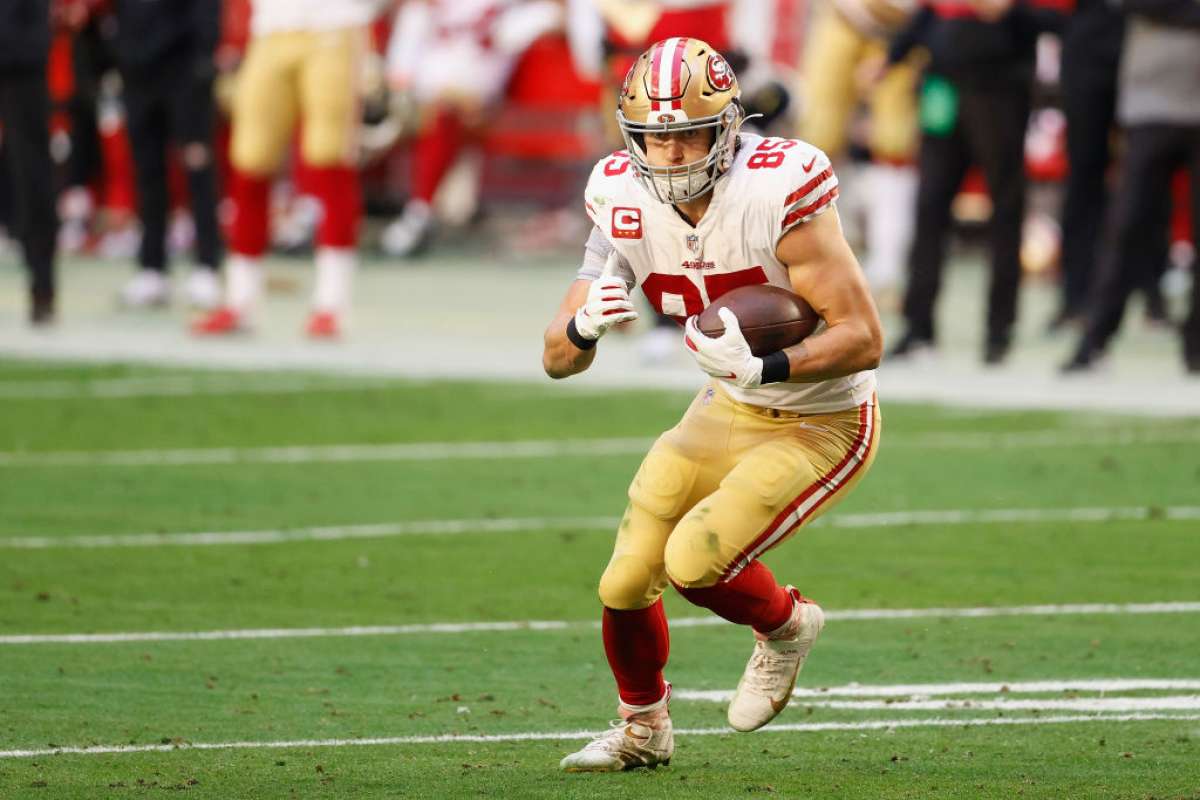 George Kittle runs on the field during a San Francisco game.