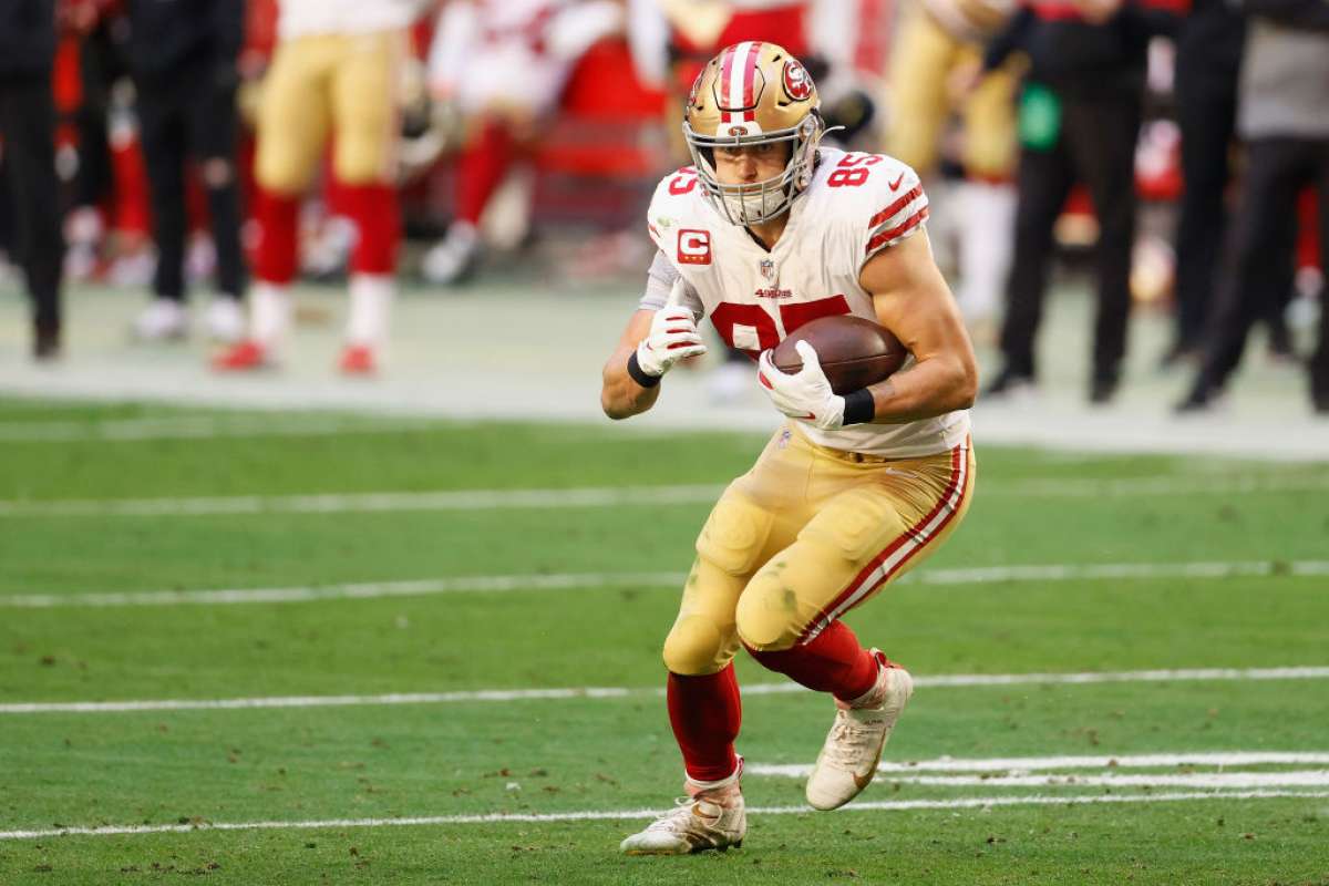 George Kittle runs on the field during a San Francisco game.