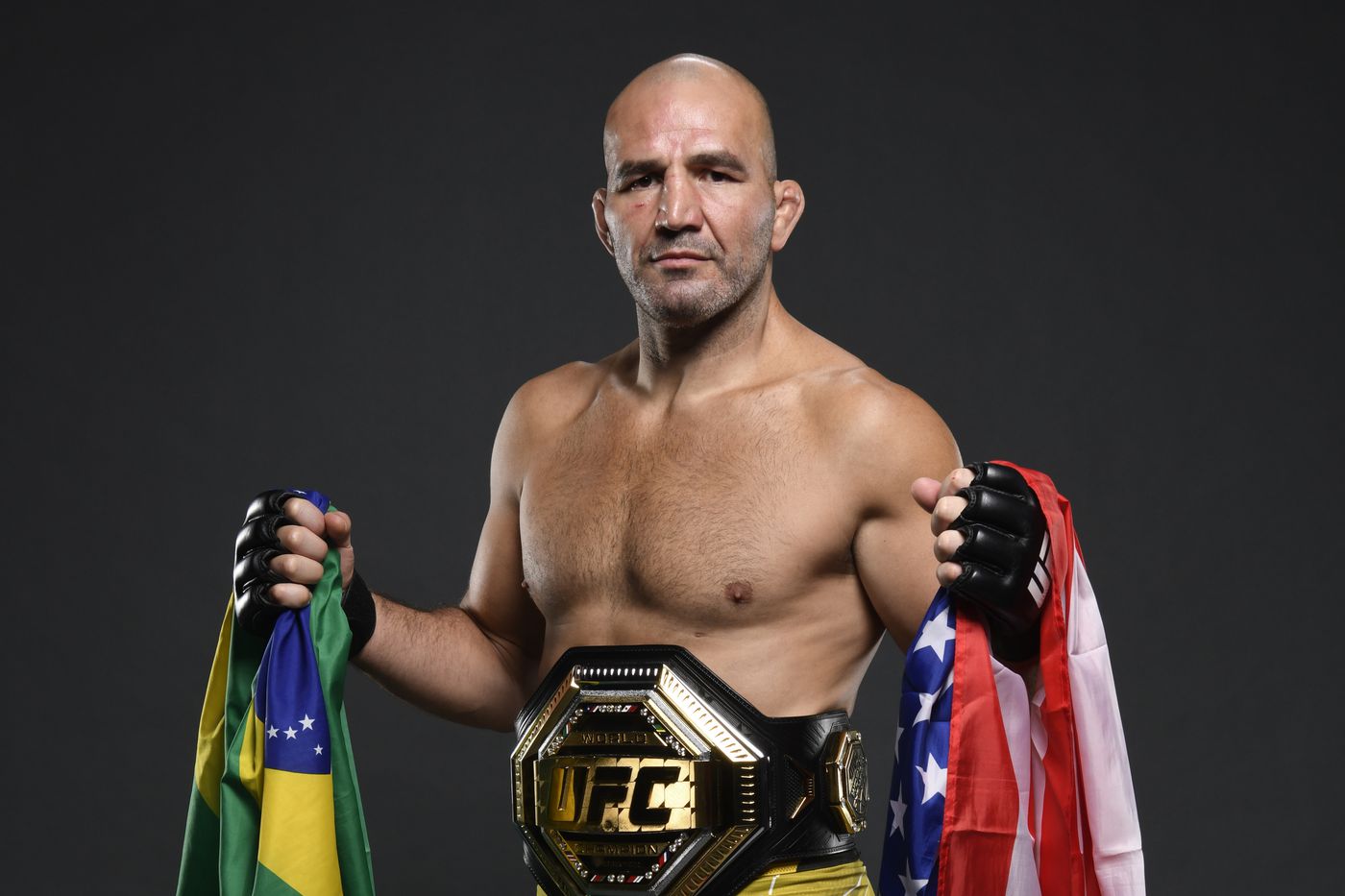 Glover Teixeira holding his flags of nationalities.