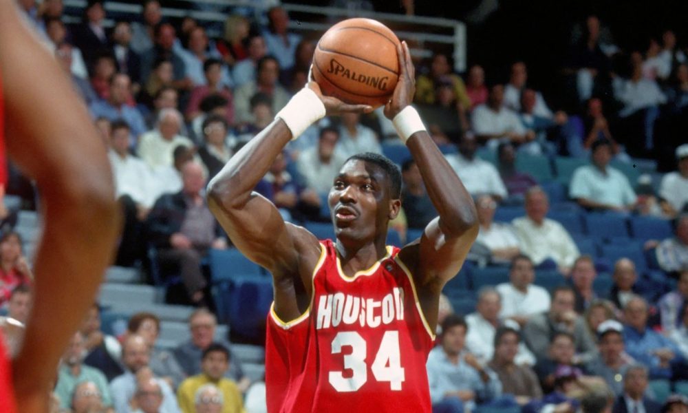 Hakeem Olajuwon takes a jumpshot during a Houston Rockets game.