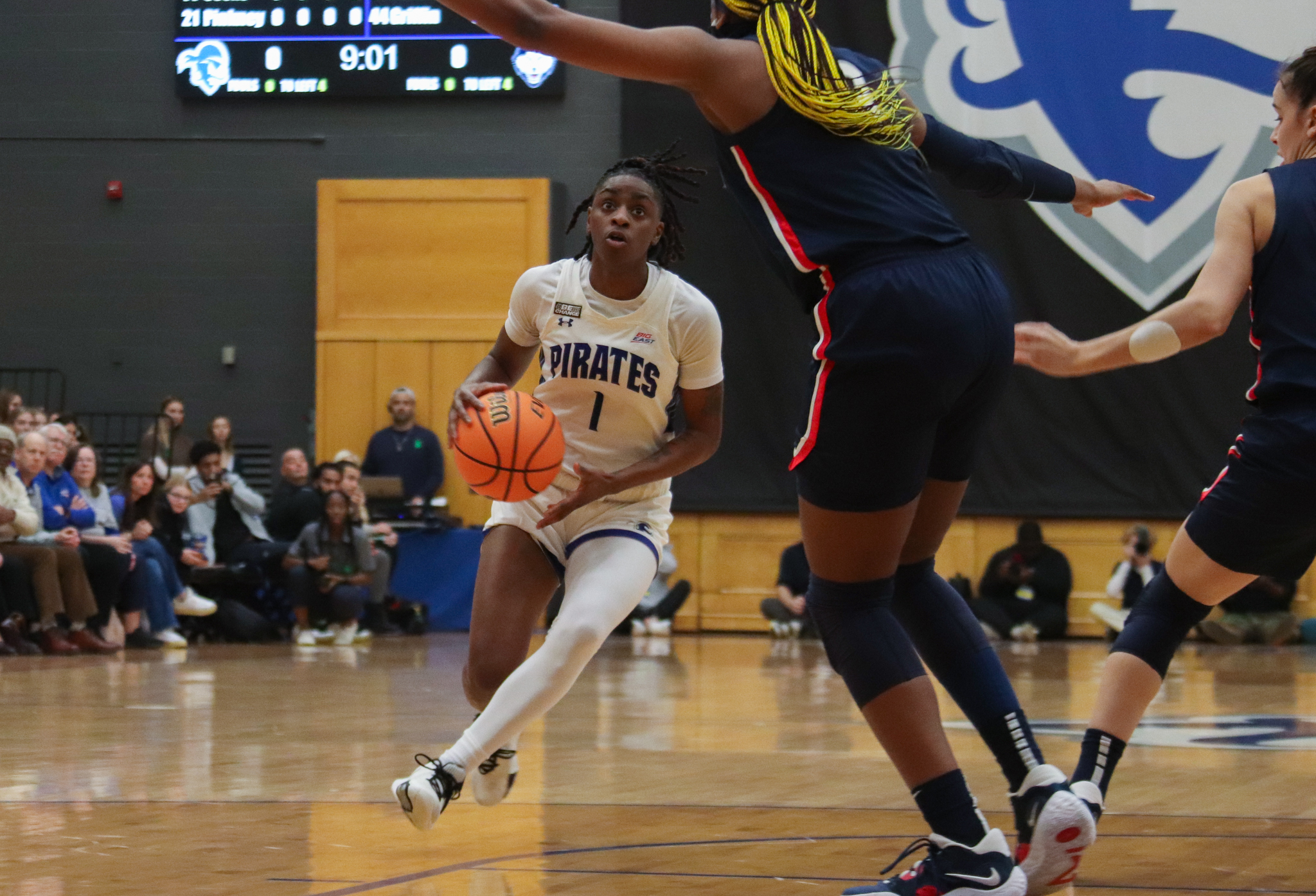 Shay Hagans works against a UConn defender.