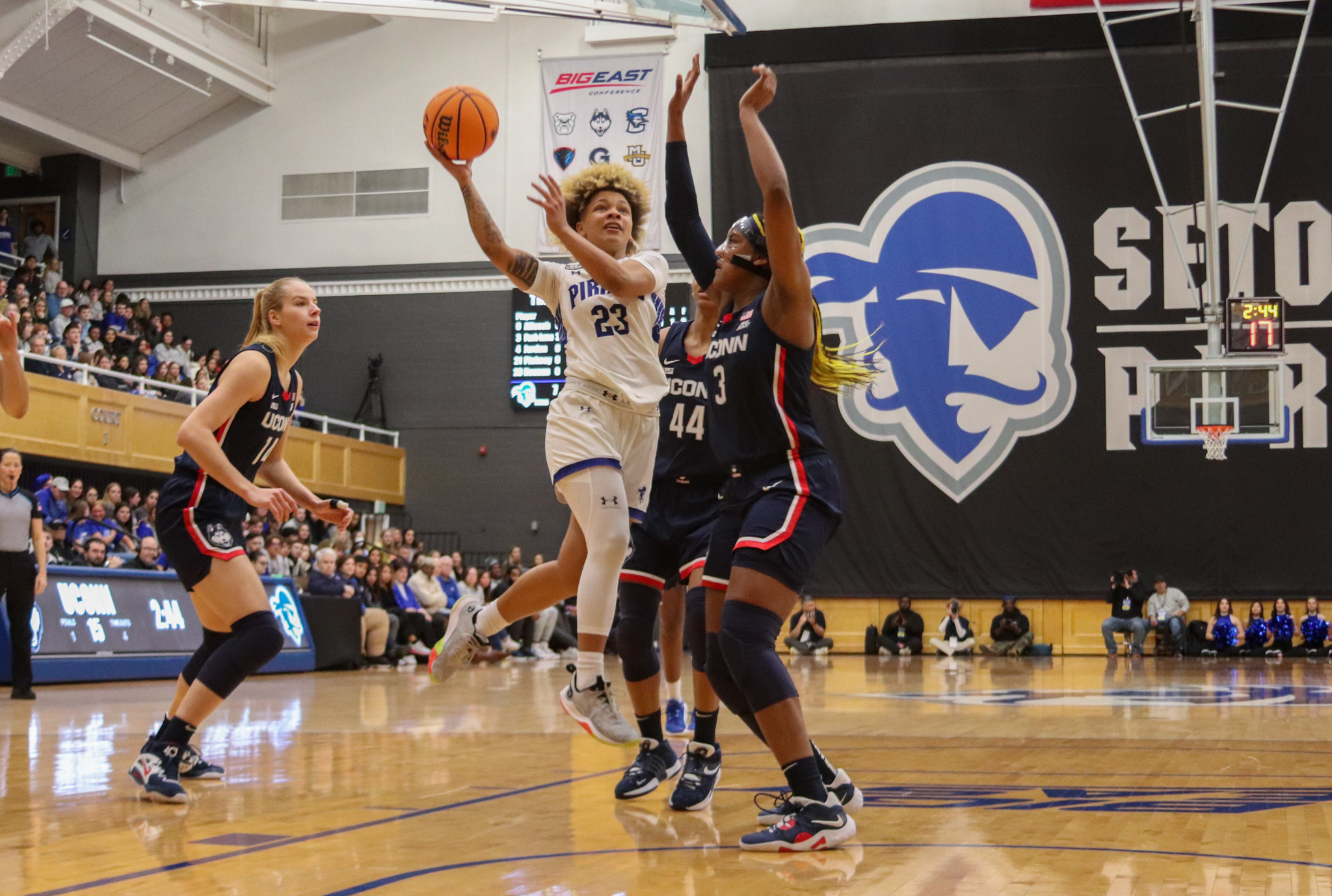 Victoria Keenan takes it to the hole against UConn.