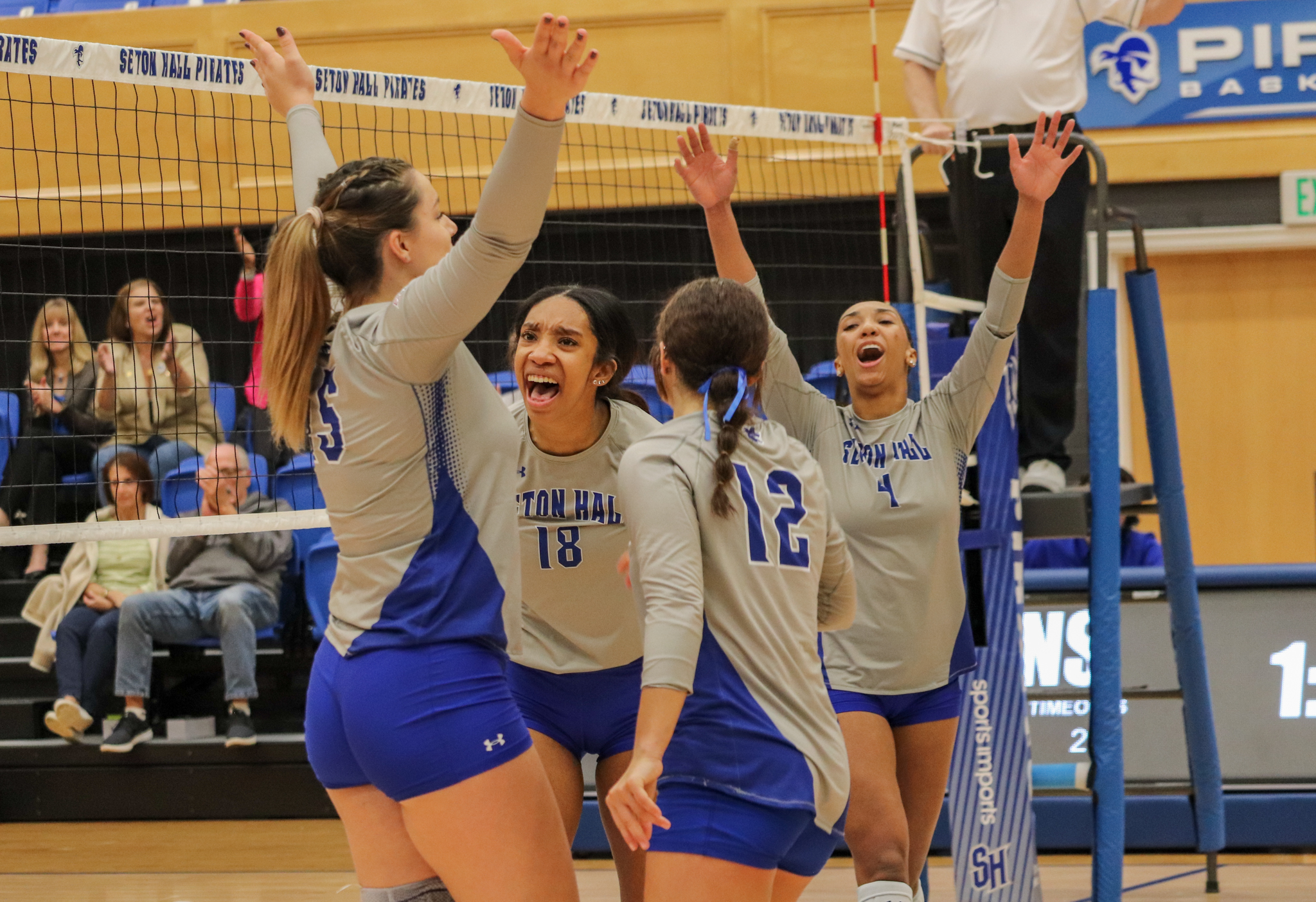 The Pirates celebrate after a vital win.