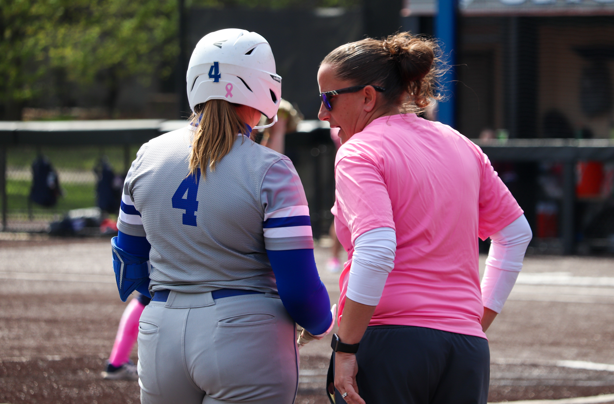 Kelsey Carr by the dugout.