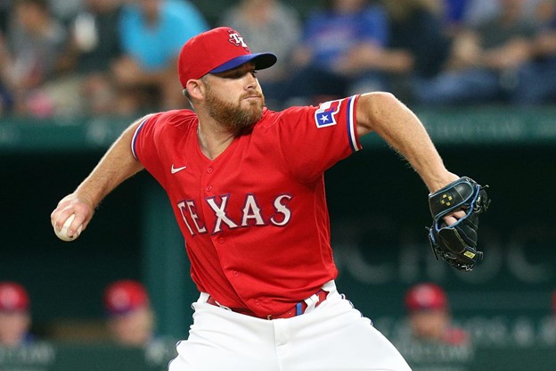 Ian Kennedy throws a pitch during a Texas Rangers game.