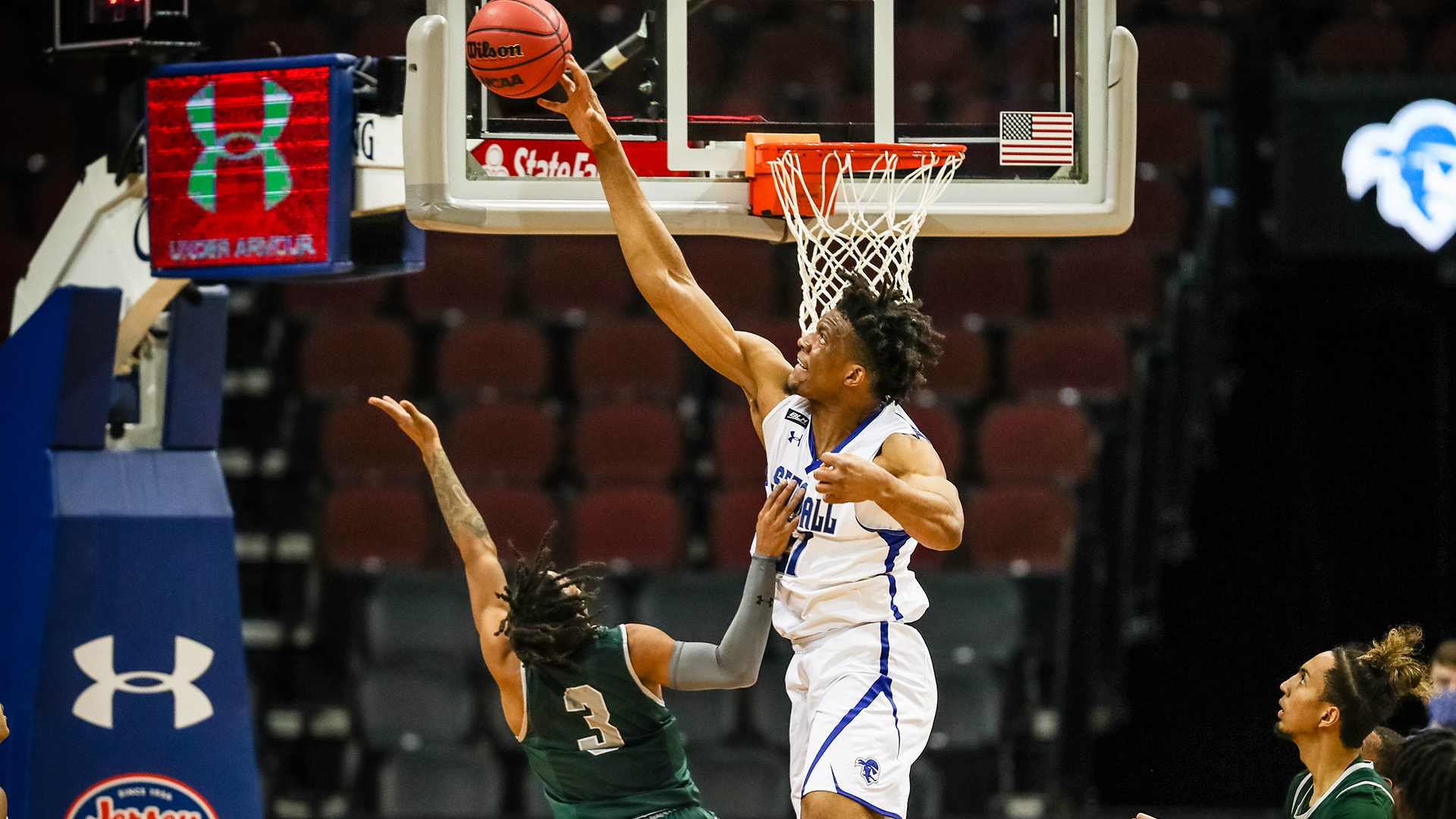Ike Obiagu tries to block his opponent during a Seton Hall men's basketball game.