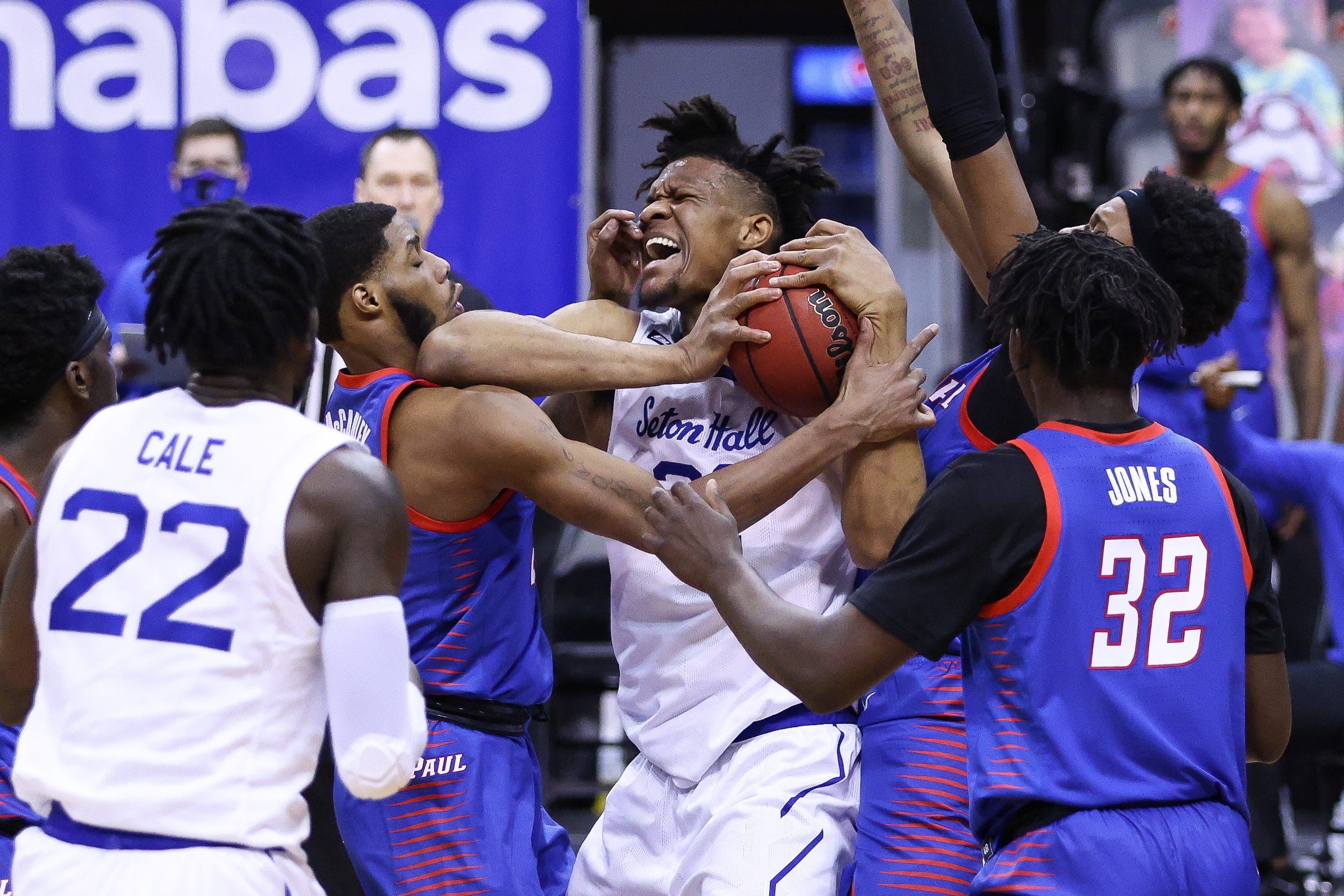 Seton Hall's Ike Obiagu wrestles for a loose ball during a Seton Hall men's basketball game.