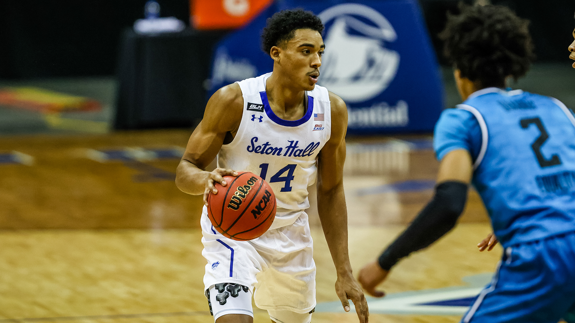 Jared Rhoden makes a dribble move during a Seton Hall game last season.