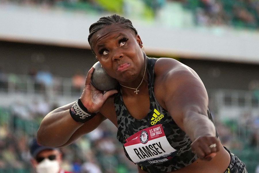 USA's Jessica Ramsey begins to throw a shotput to try and win her event.