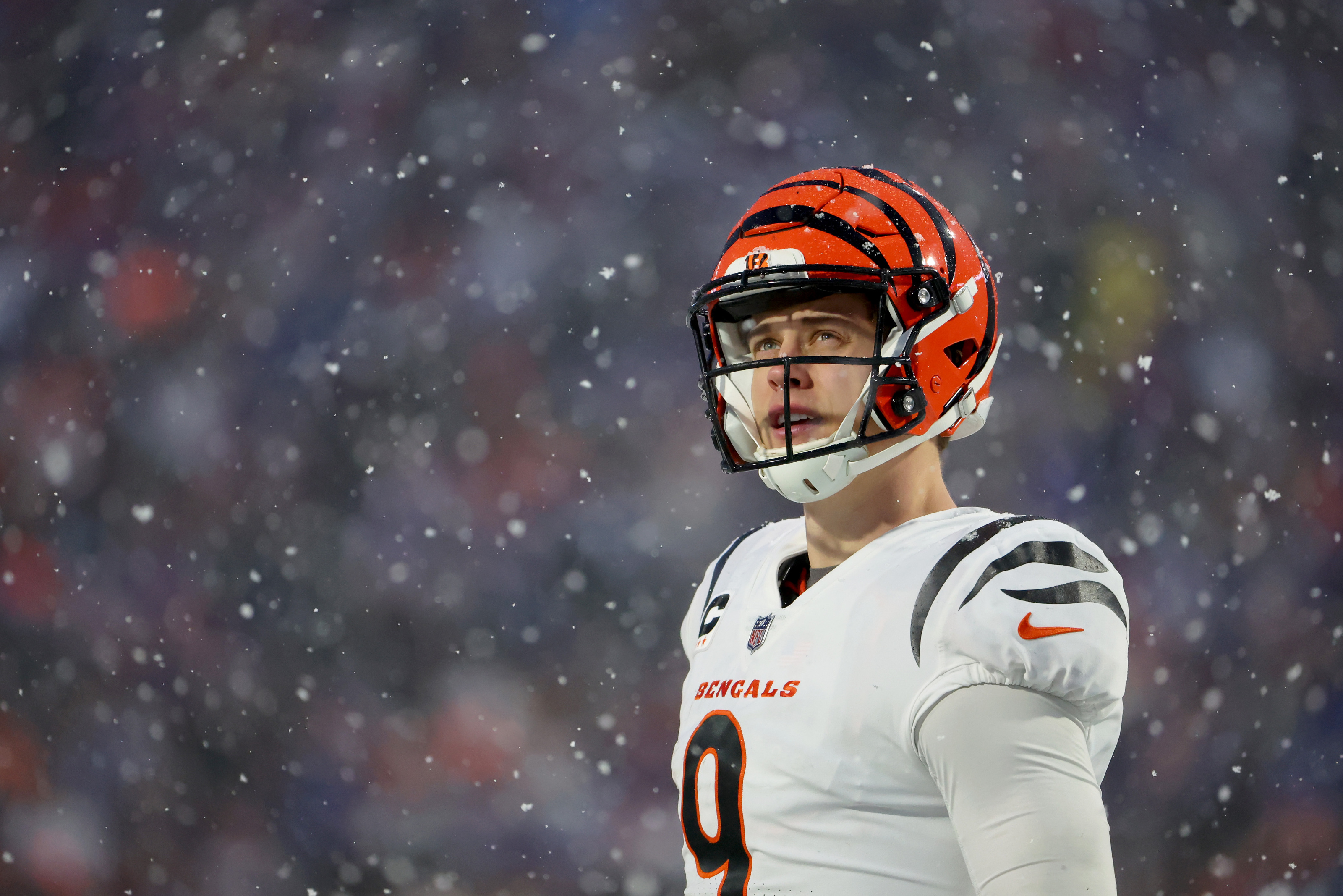 Joe Burrow in the snow after beating the Bills in the playoffs.