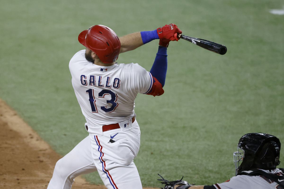 Former Texas Ranger Joey Gallo takes a swing at the plate during a MLB game.