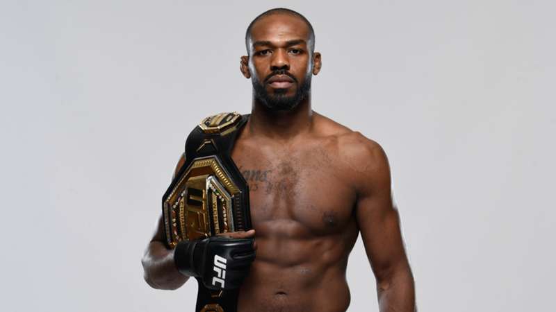 Jon Jones with his championship belt.