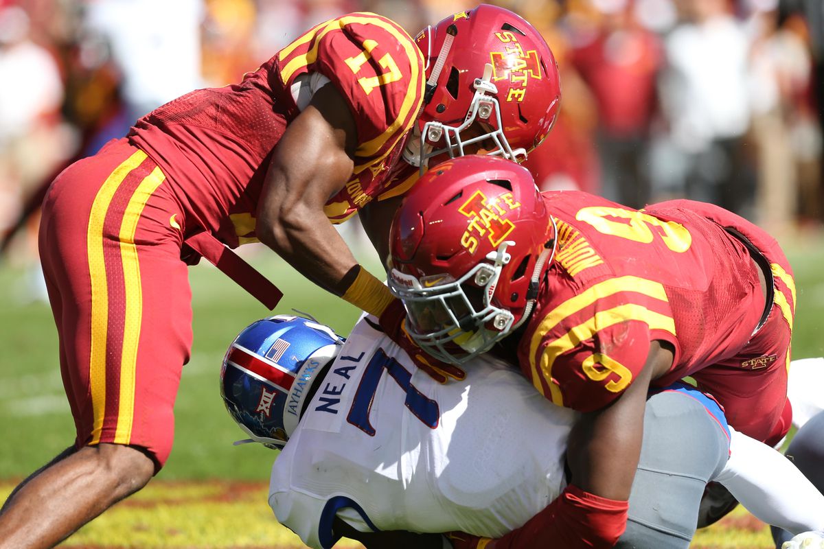 Kansas player gets tackled.