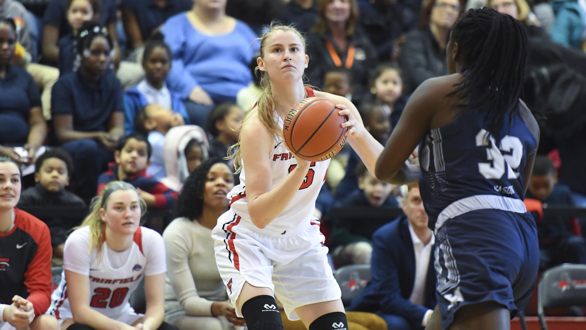 Katie Armstrong attempts to take a jumpshot during a Fairfield women's basketball game.