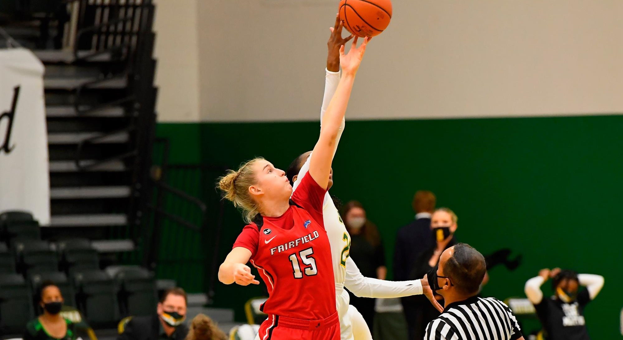 Katie Armstrong attempts to grab a rebound during a game.
