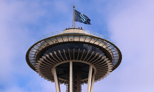 The Seattle Space Needle has the Seattle Kraken flag on it.