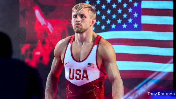 Kyle Dake stands before wrestling in an Olympic match.