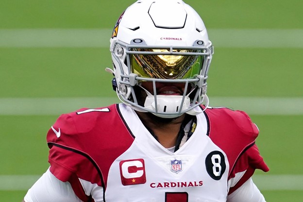 Kyler Murray wears his helmet and jersey during a Arizona Cardinals game.