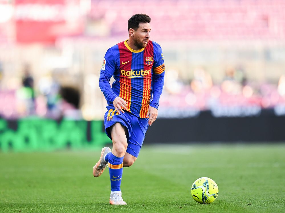 Barcelona's Lionel Messi looks to kick the soccer ball during a game.