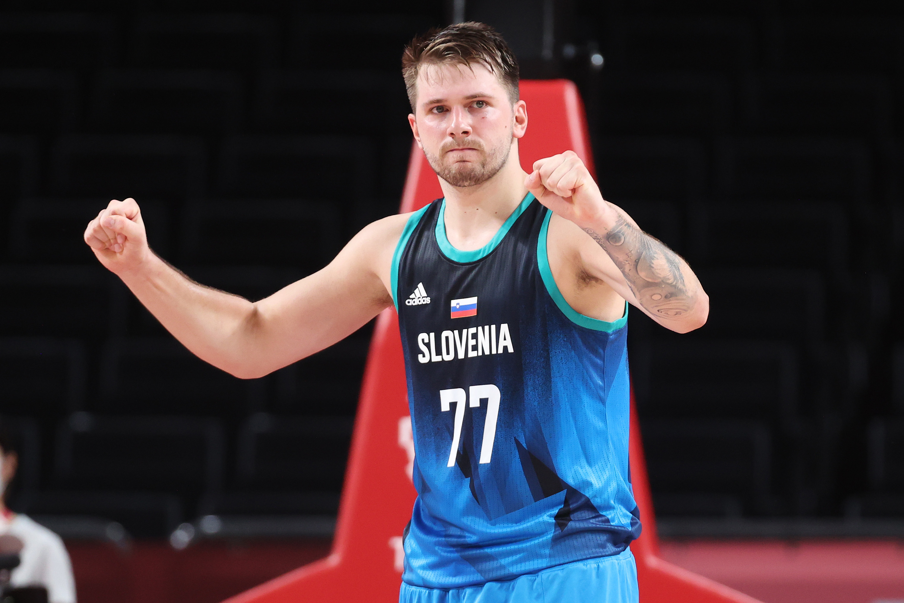 Slovenia's Luka Doncic celebrates after winning in the Olympic Games.