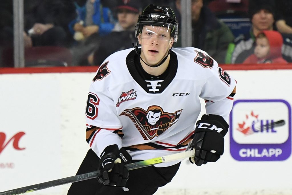 Luke Prokop plays in a minor league hockey game and skates looking for a goal.