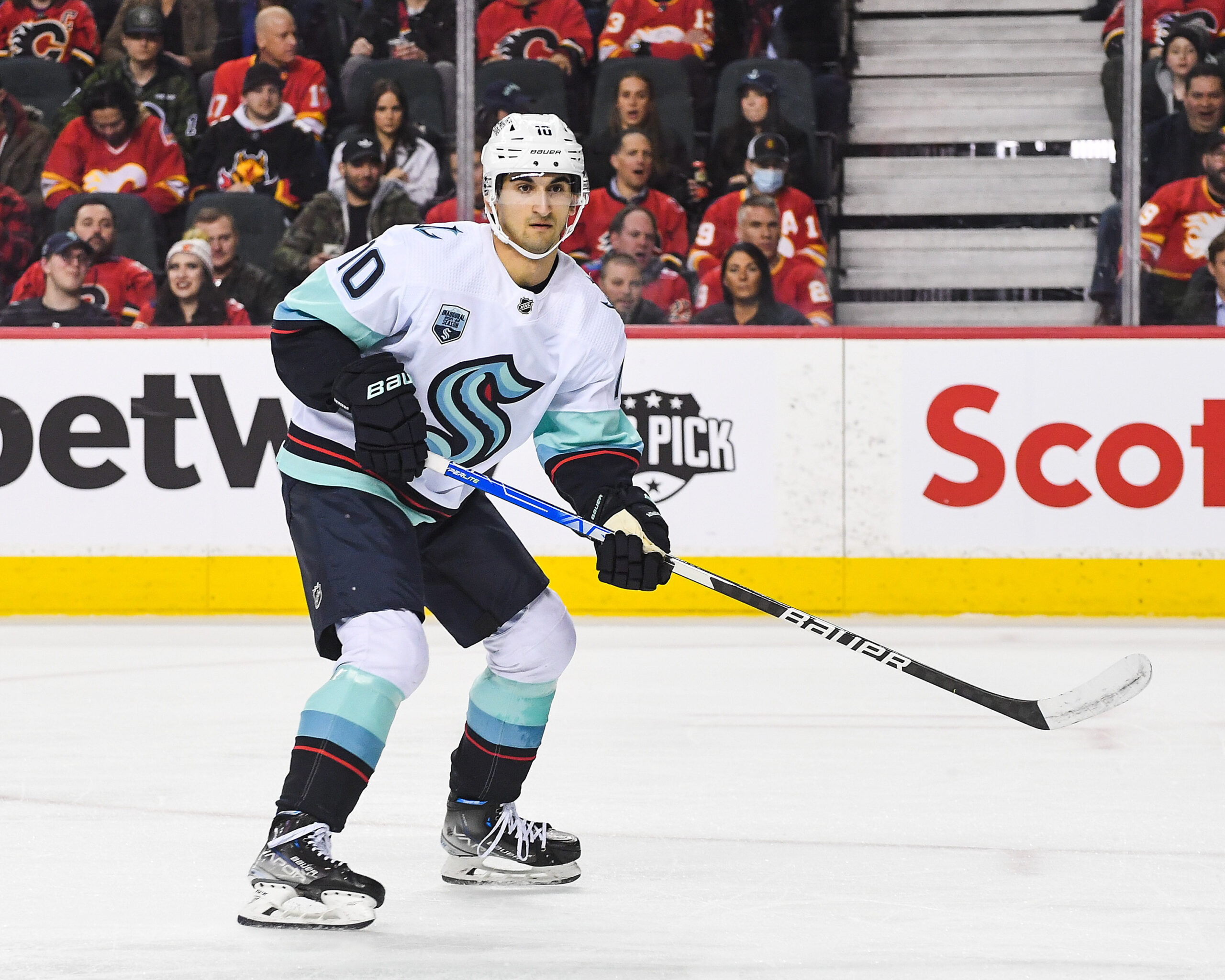 Seattle's Matty Beniers skates on the ice during a game.