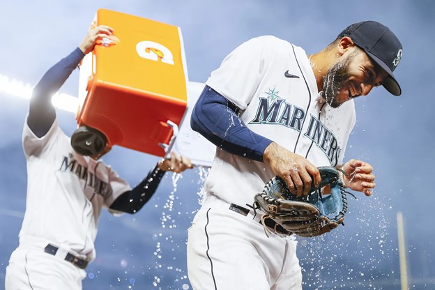 The Seattle Mariners celebrate with the Gatorade tradition after winning a MLB game.