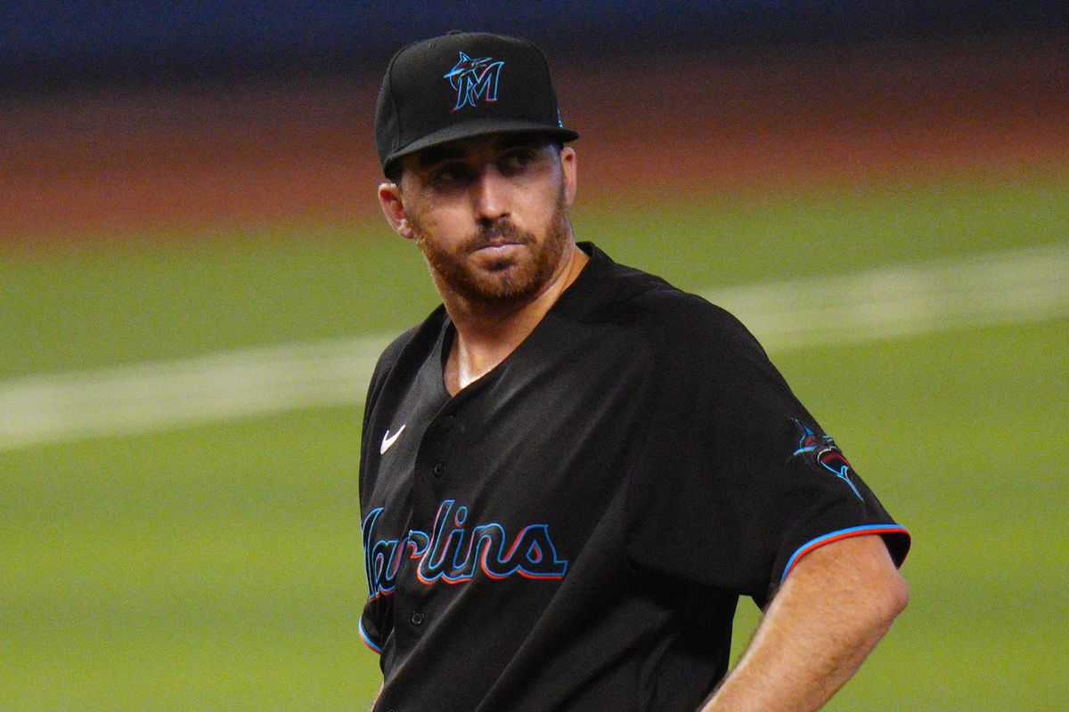 A Marlins player is frustrated on the mound because of Miami's losing streak lately.