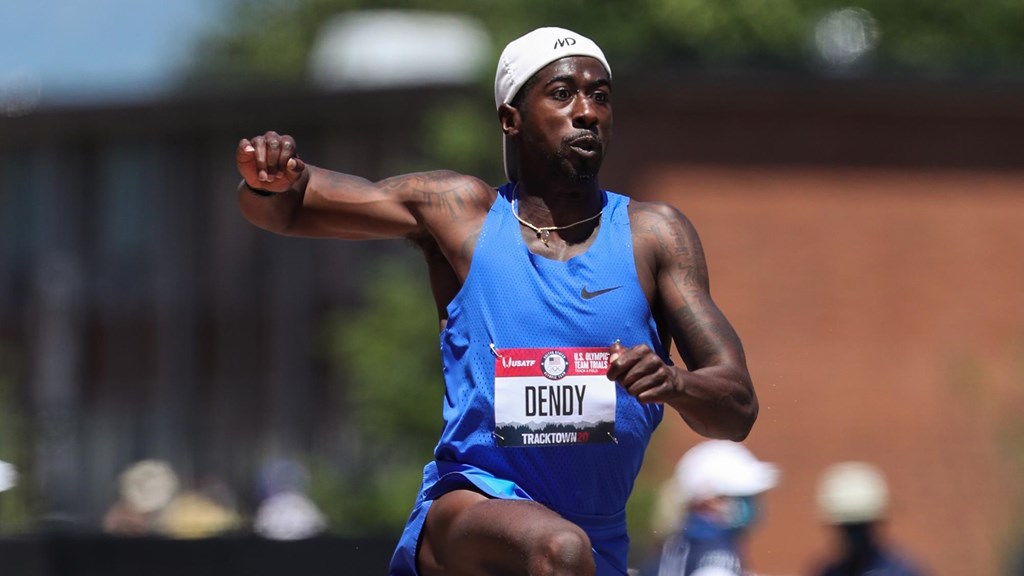 Team USA's Marquis Dendy runs during his track event to try and capture gold for his team.