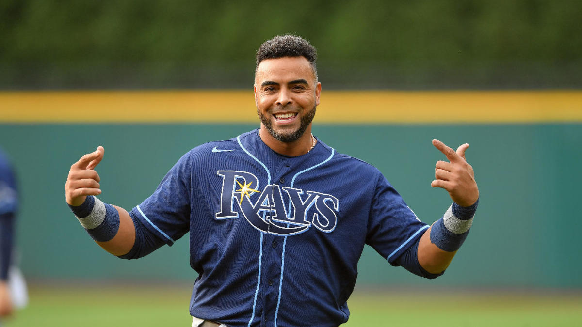 Nelson Cruz smiles as a new Tampa Bay Ray before a MLB game.