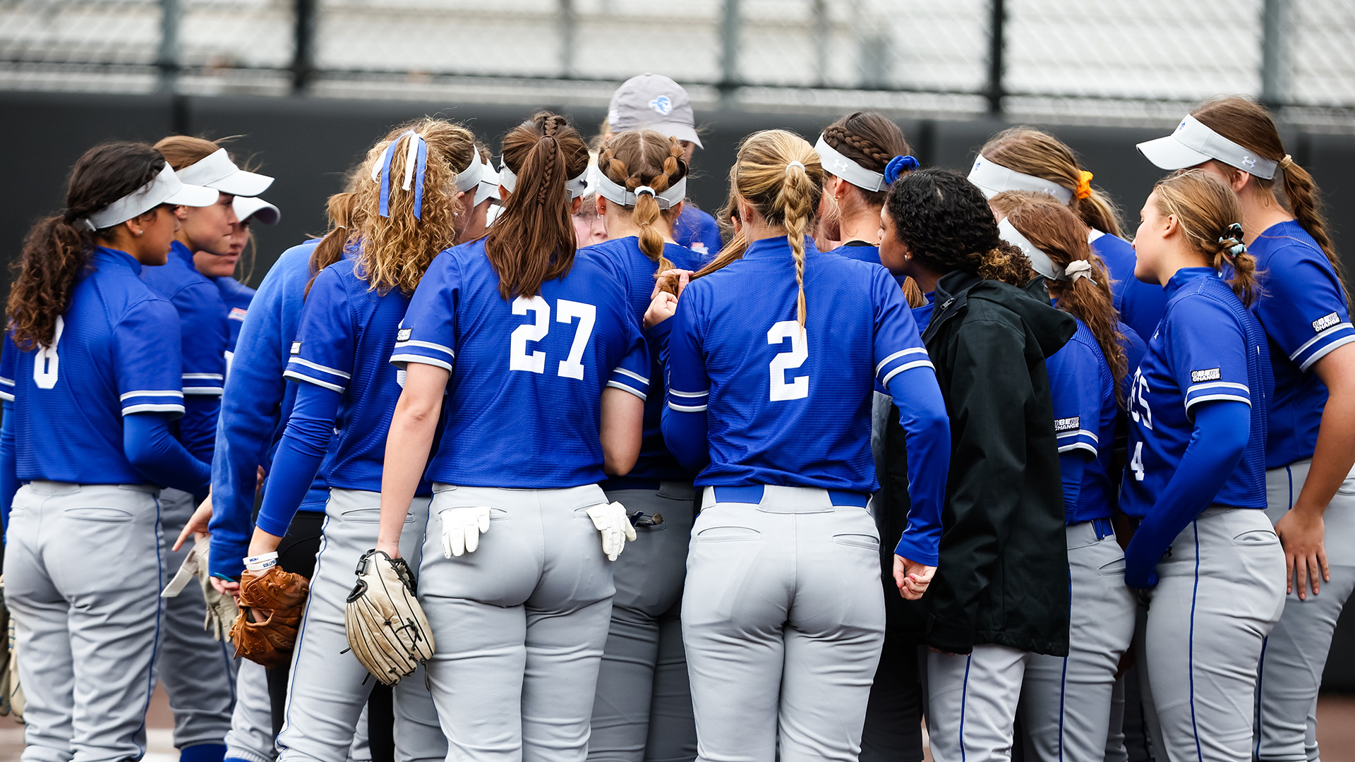 The Pirate Softball team huddled up.