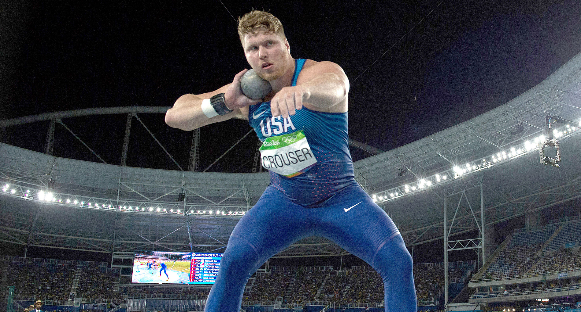 Team USA's Ryan Crouser begins to throw a shot put during a competition.