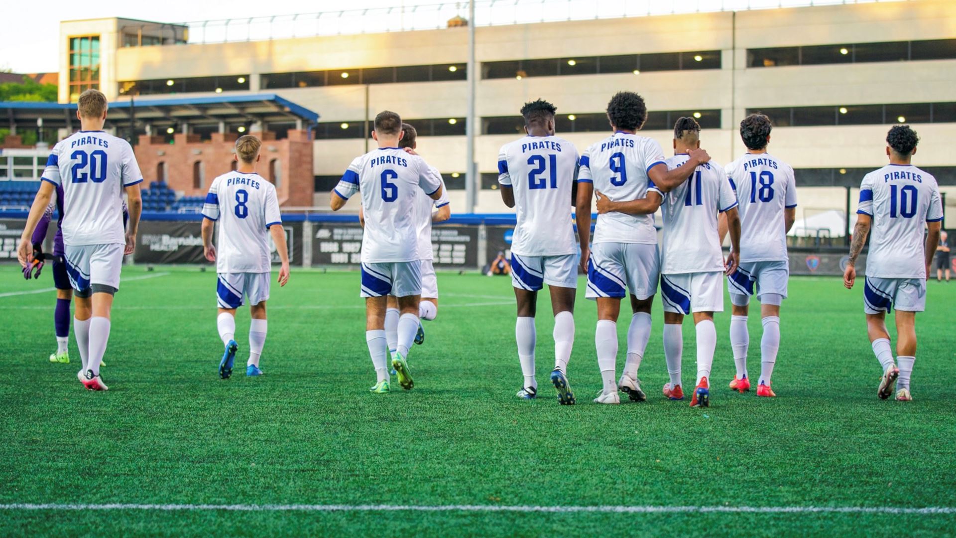 The Seton Hall men's soccer team walks onto the field during a game.
