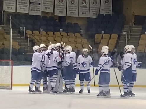 The Seton Hall men's hockey team celebrates after a home victory.