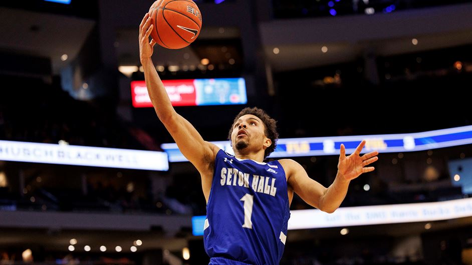 Seton Hall's Bryce Aiken attempts a layup during a road game against the Marquette Golden Eagles.