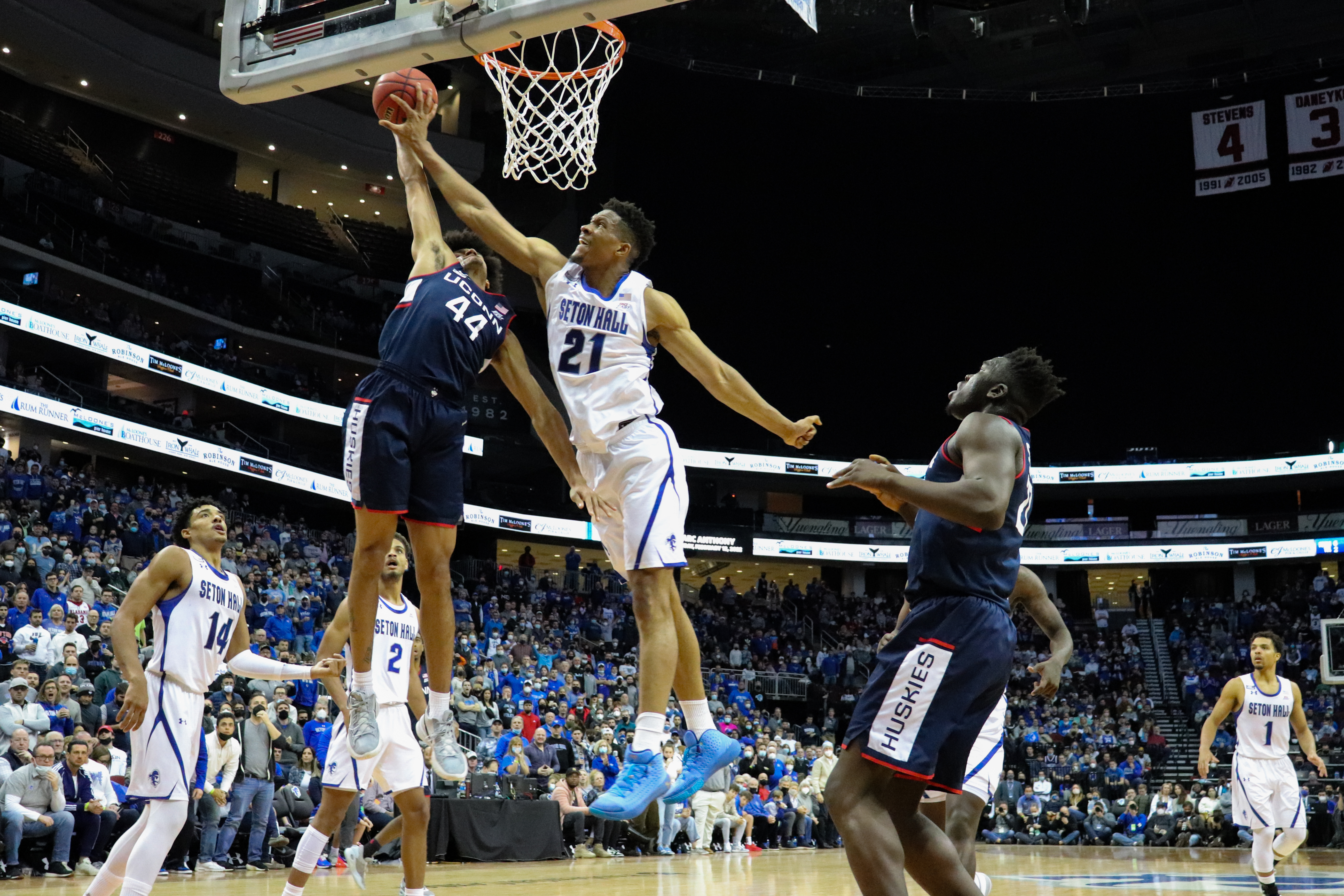 Seton Hall men's basketball's Ike Obiagu blocks a player from UConn during a home game.
