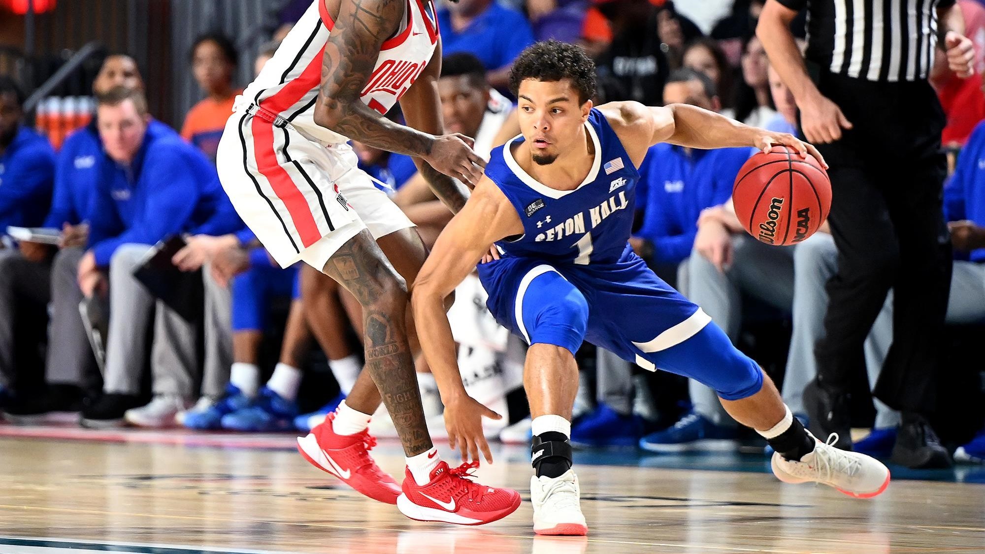 Seton Hall's Bryce Aiken avoids defenders during a Fort Myers Tip-Off game against Ohio State.