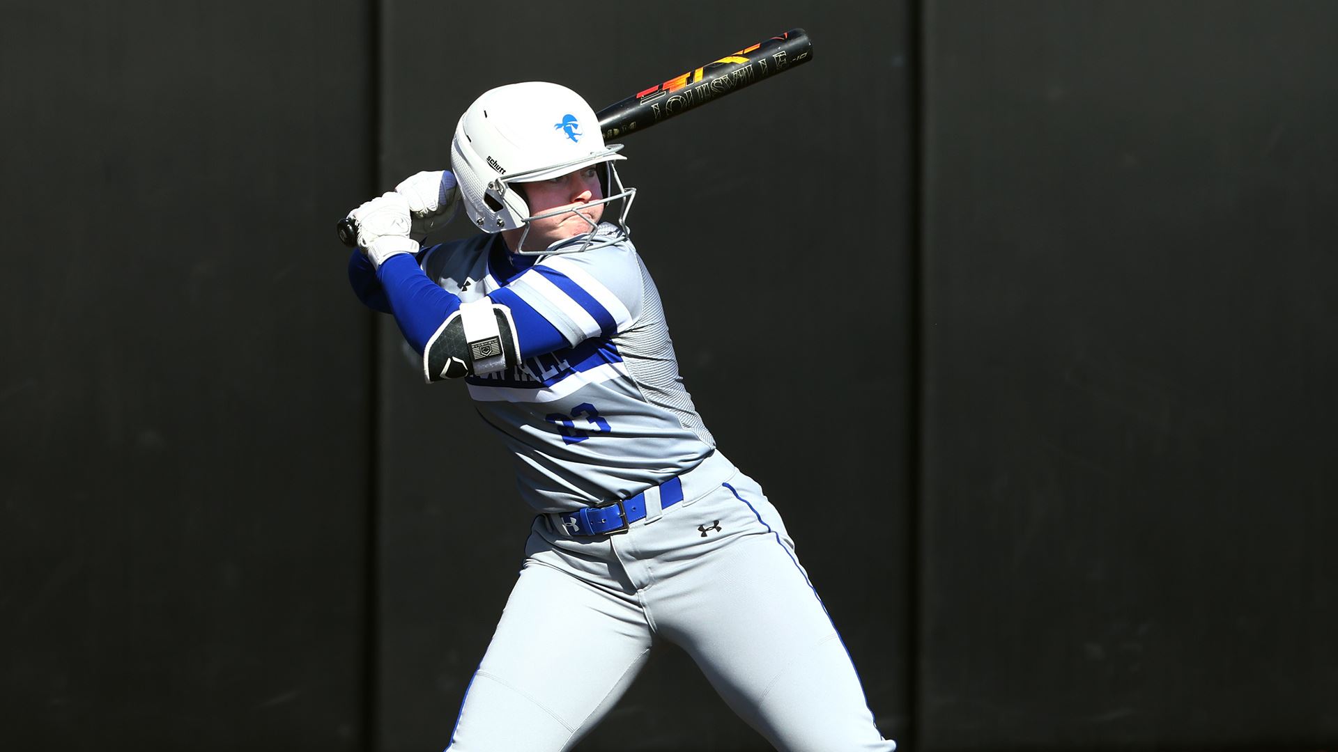 A Seton Hall softball player looks to bat on offense during a game.