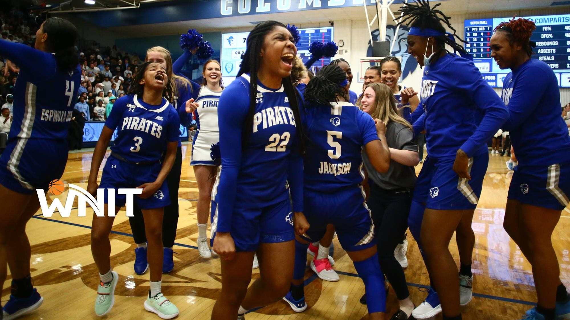 The Seton Hall women's basketball team celebrates during a WNIT Final Four game.