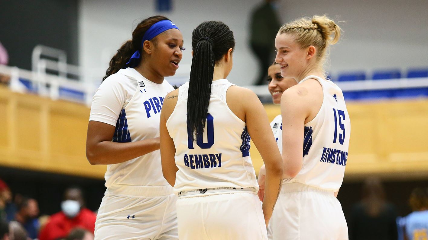 Members of the Seton Hall women's basketball huddle during a home game.