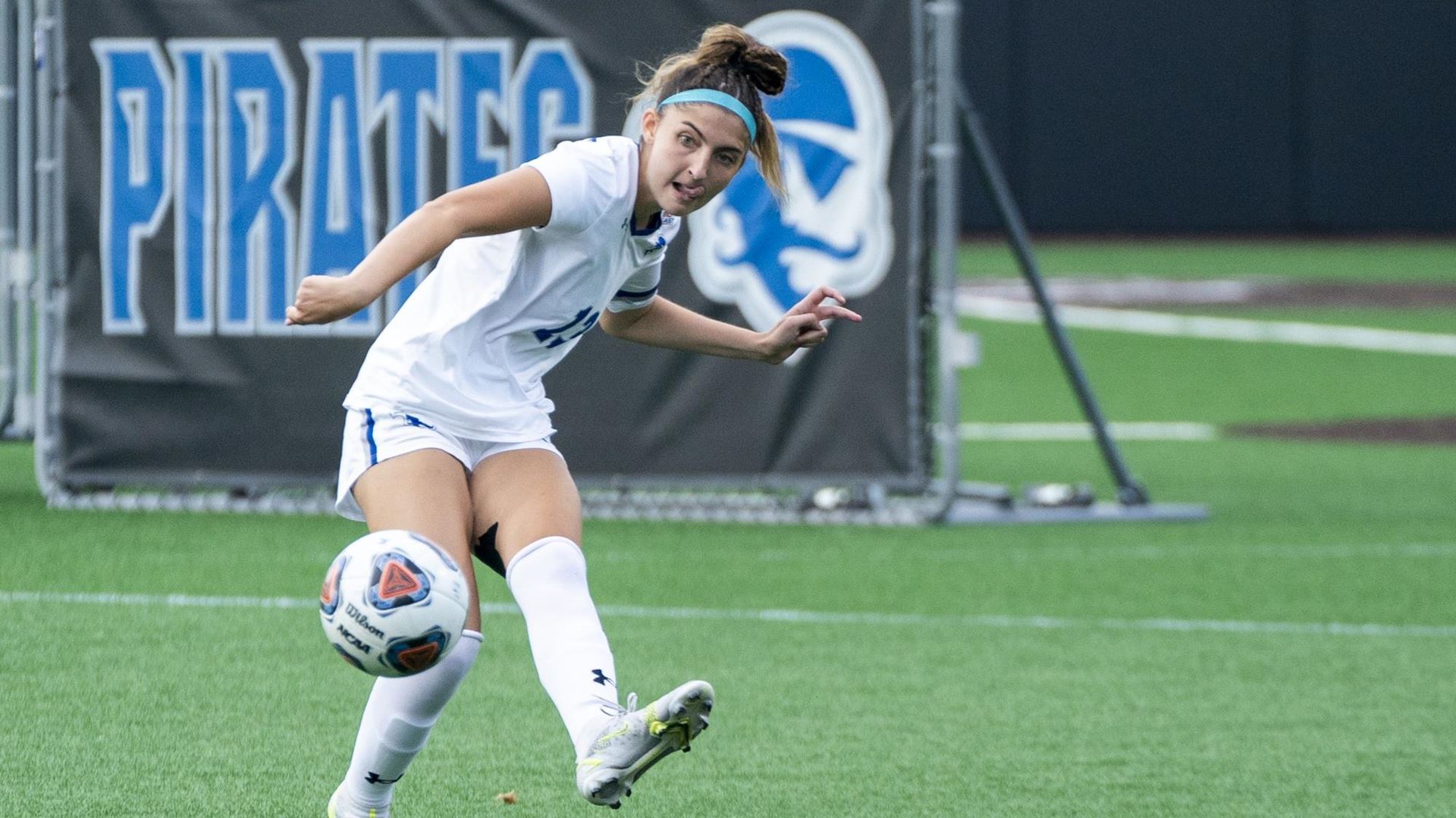 A Seton Hall women's soccer player dribbles the ball during a home game.