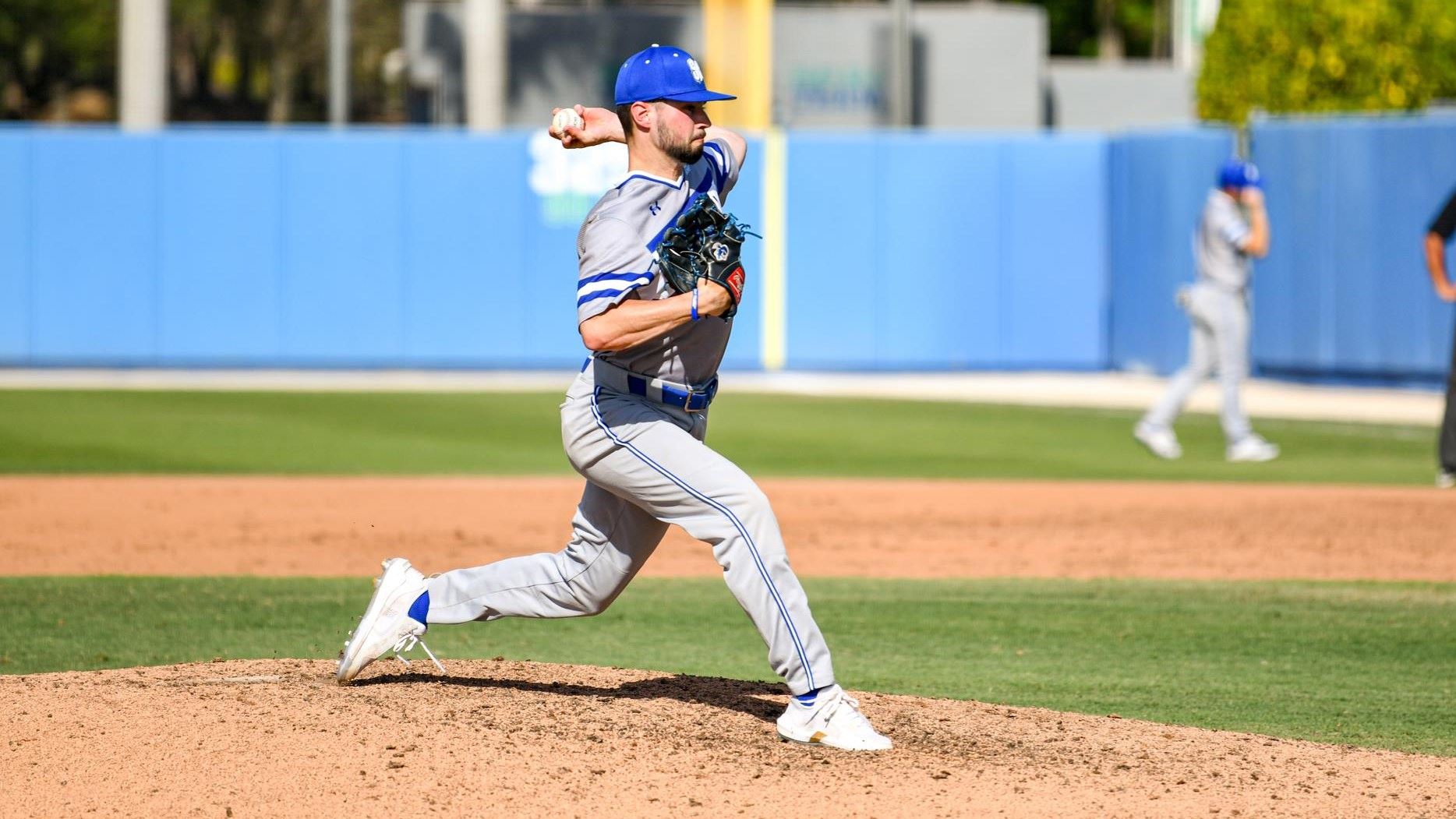 A Seton Hall baseball pitcher attempts a throw on the mound during a game.