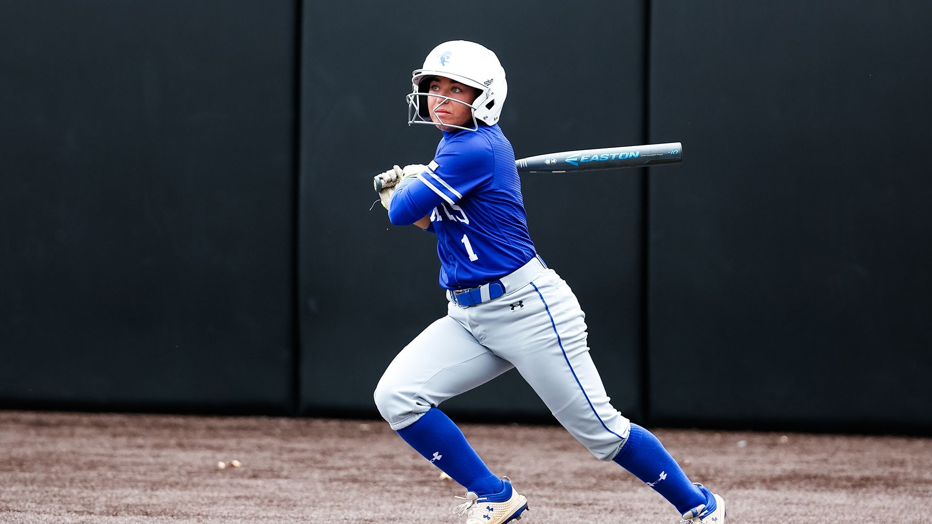 A Seton Hall softball batter stands at the plate during a game.