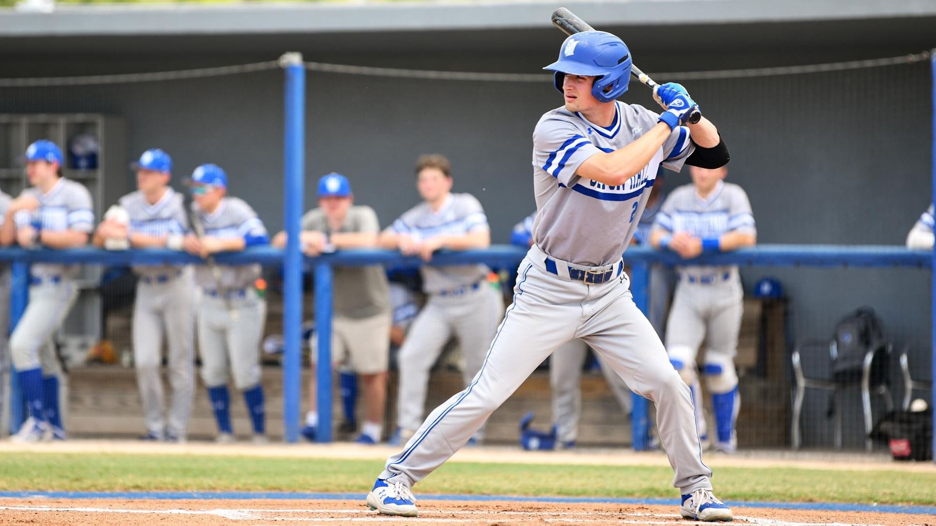 A Seton Hall batter looks to hit during a game.
