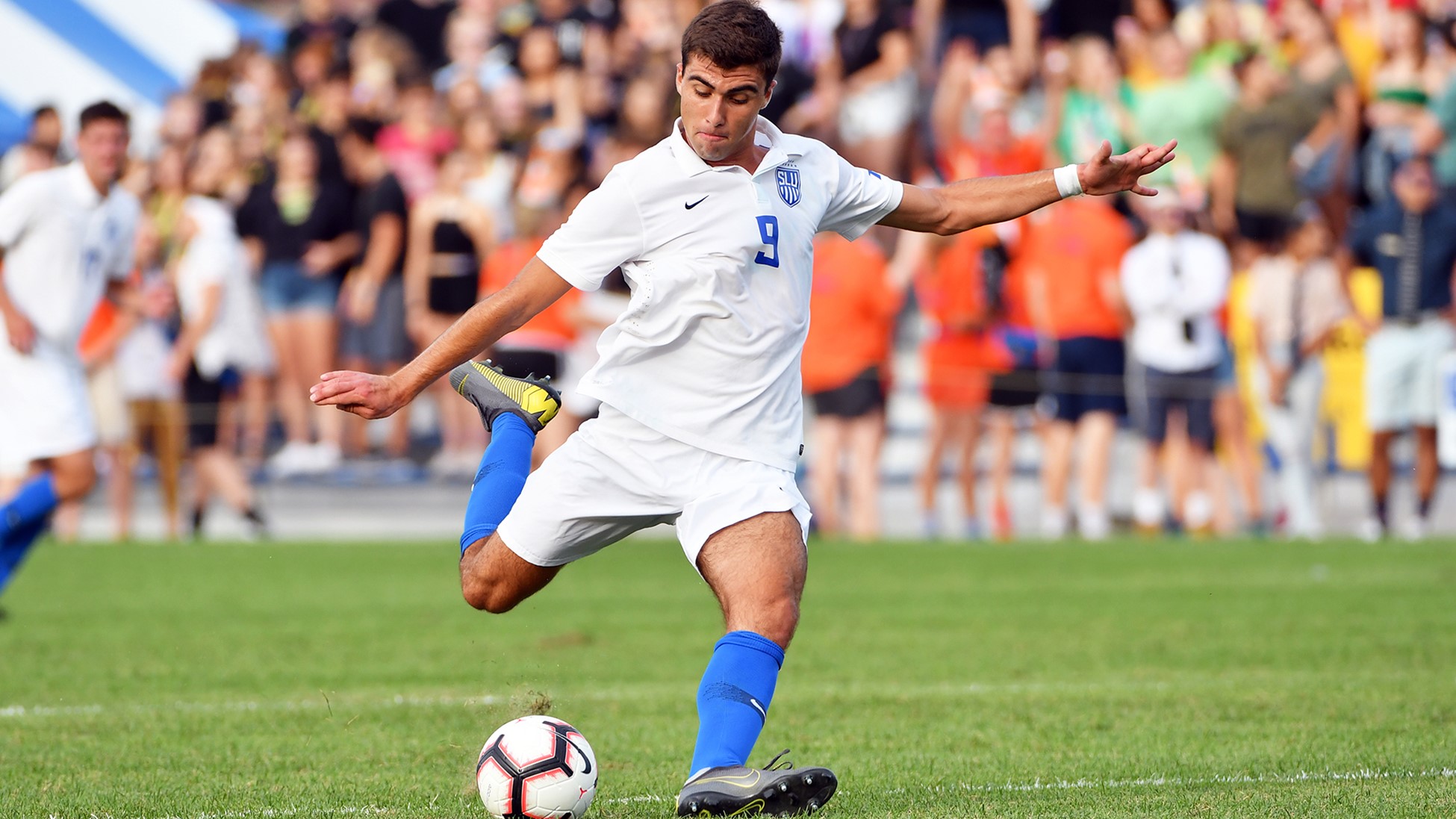 Georgetown's Stefan Stojanovic attempts to kick a ball during a game.